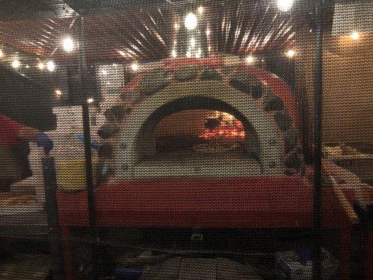 You can watch them make your pizza! It's fun for the whole family! Holy Cow!