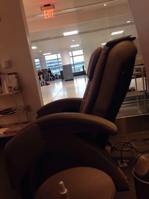 Sit in a massage chair while you get a mani!