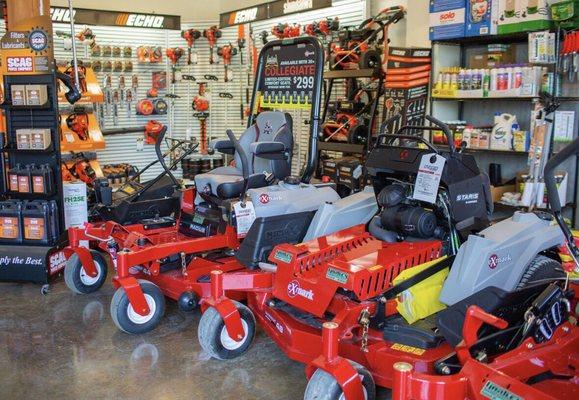 eXmark, Echo and Shindaiwa Handhelds (in the back) as well as plenty of commercial grade and homeowner grade weed killers and fertilizers.