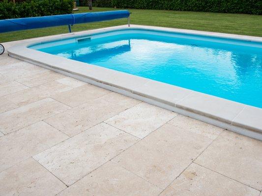 Light Ivory Travertine 16X24 Tumbled Outdoor Pool Deck Paver Remodeling Project by Faber Cnk Stone Dallas