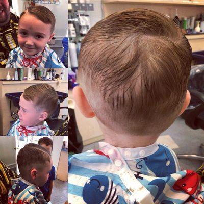 This little handsome guy is wearing the "prohibition style" with a hard part. Done by Metta