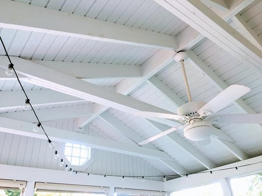 After picture of mold/mildew removed from the underside of screened in porch roof