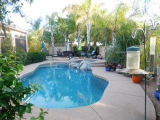 Beautiful Santa Fe style home on quiet street. Pool with a spacious yard. Peaceful And Quite Backyard. A True Oasis.