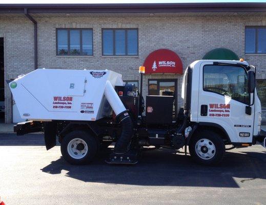 ONE OF OUR POWER SWEEPING TRUCKS