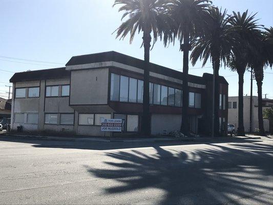 Building where clinic is located. Corner of Carson st. and Gramercy ave. Parking lot in back