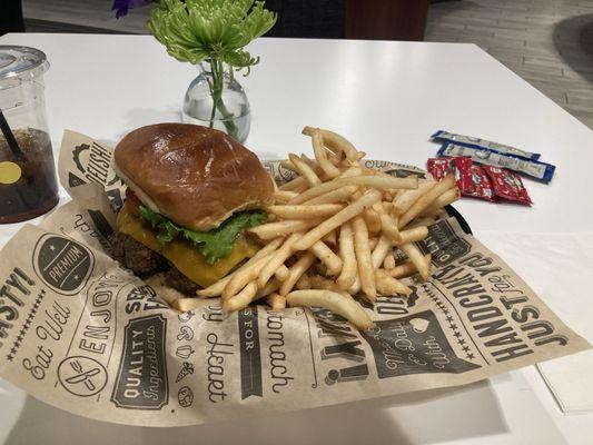 American cheeseburger with French fries.