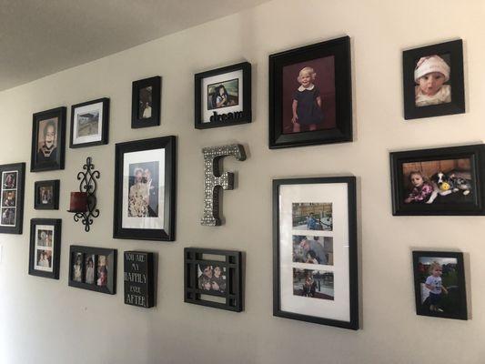 Family picture array. We can hang art and family photos in an artistic way. Your design or ours.