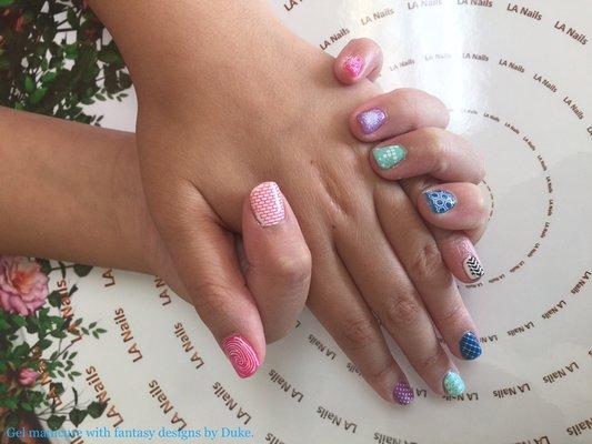 Gel manicure with fantasy designs by Duke.