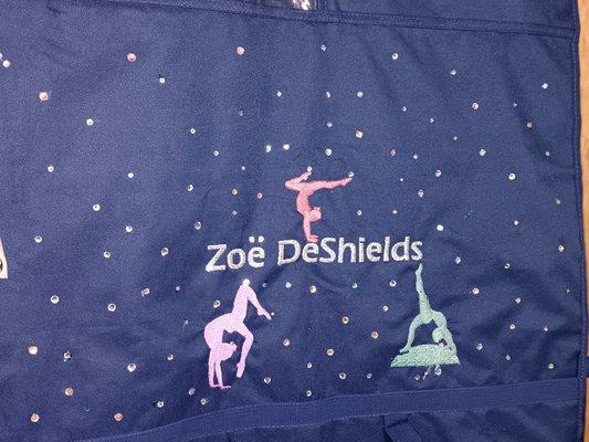 Custom garment bag designed for a gymnastics to show off our customers style.