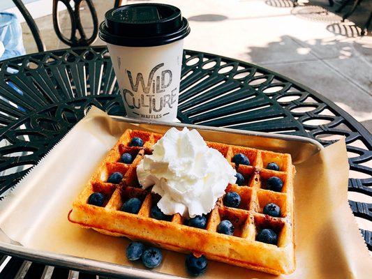 jam-stuffed waffle topped w/ whipped cream and fresh blueberries