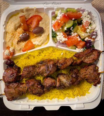 Lamb kobob plate with rice, hummus and side Greek salad. Also came with pita bread for dipping.