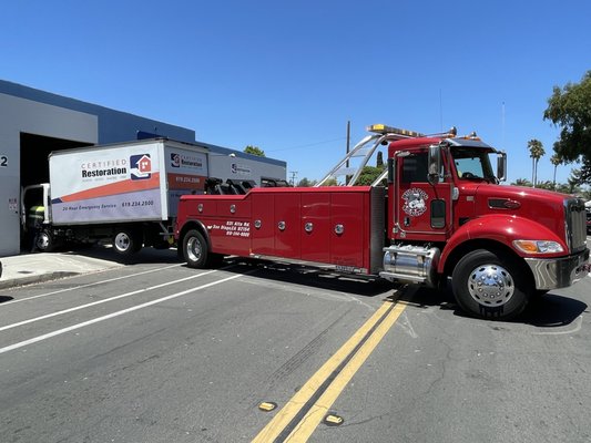 He used blocks to raise the end of the truck for a proper hook up