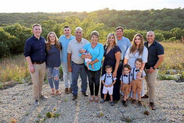 Family sunset photo on the Kansas prairie.