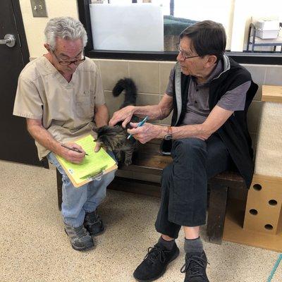 at the shelter...filling out the paperwork for our new kittiy's adoption.