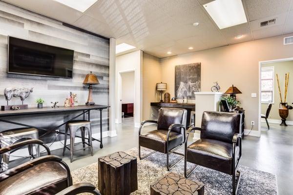 Our clients love the rustic and spacious Broker Lounge where they can enjoy TV, coffee, sweets, free WiFi and more!