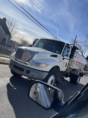 Truck blocking the entire two way street.