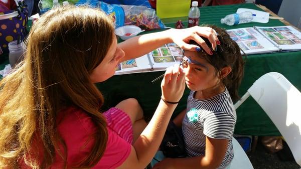 Face painting at watermelon festival