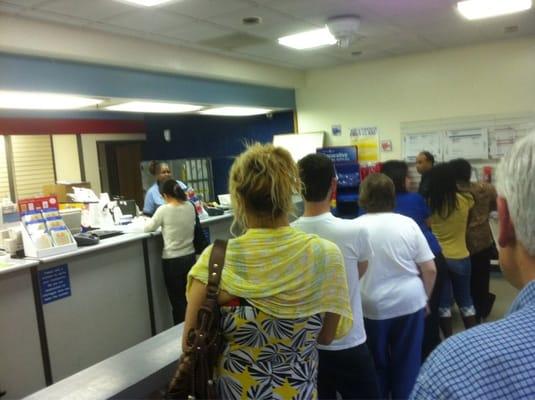 Typical experience. Long line. One person working.