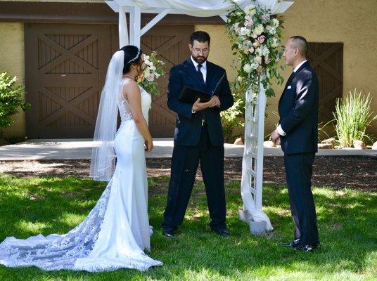 Ceremony in front of barn doors