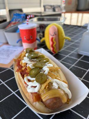 New! NACHO DOG! All beef 1/4lb dog, nacho cheese, tomatoes, onions, jalapeños, seasoned tortilla chips, and sour cream!!