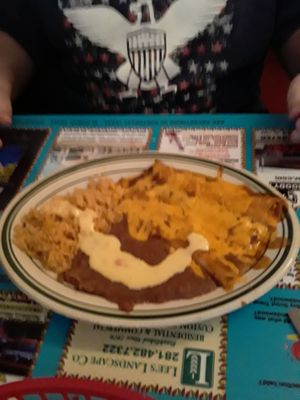 Enchiladas, brans & rice with added cheese sauce