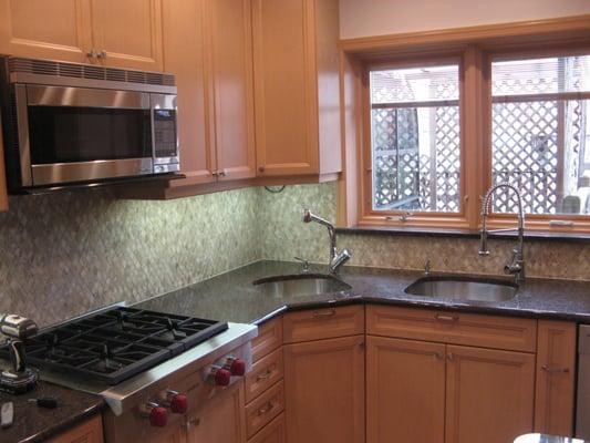 kitchen renovation 
 new back splash
 new window