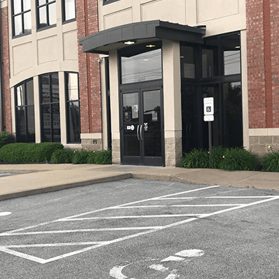 Exterior photo of First Mid Bank & Trust St. Peters location showing wheelchair accessible entrance.