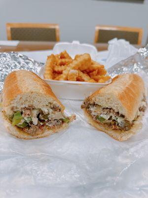 Cheesesteak combo which includes a can of soda.