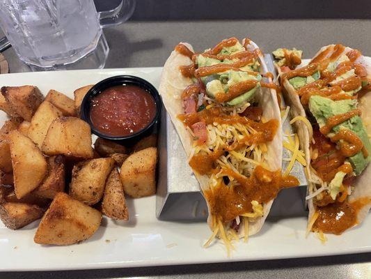 Breakfast bacon tacos with side of potatoes