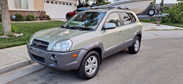 New paint and headlight housings on a 15 year old Hyundai. Looks new!