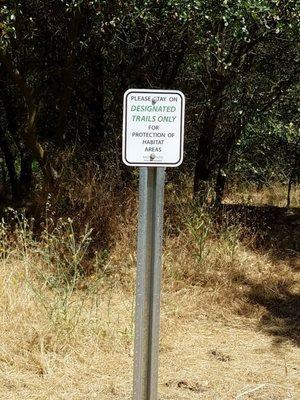 Lots of these warning signs.  Stay on the trail!