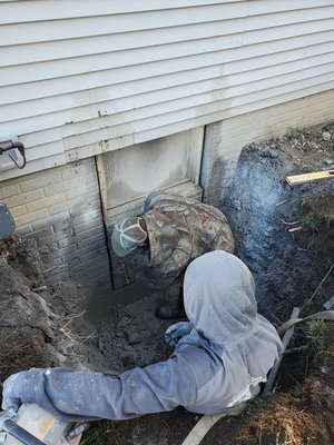 Egress window for this crisp Saturday morning. Adding equity to your home. Making it safe for you and your family.