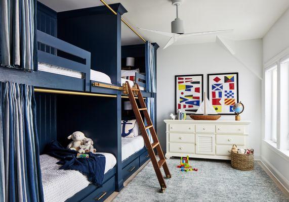 Custom built in bunk beds with privacy curtains