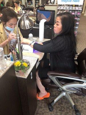 My mom getting her nails done