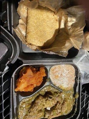 Costillitas en salsa verde con nopales. (Pork riblets in green salsa with cactus and homemade tortillas.)