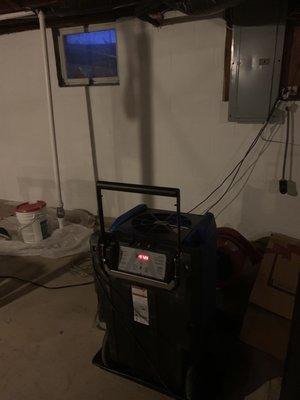 Drying equipment set up in the basement after a leak from my dishwasher.