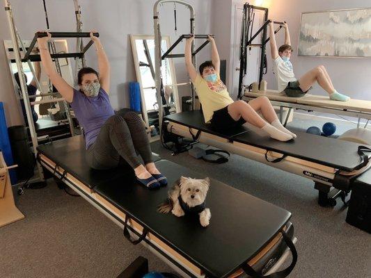 Mother doing Pilates with her kids