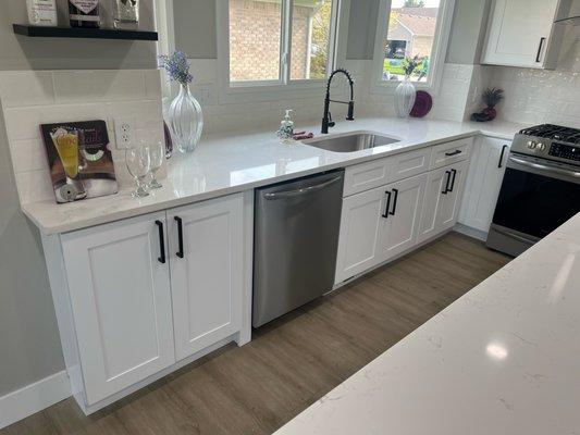 Bay window with white shaker cabinetry