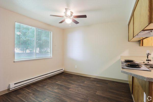 The dining area is right off the kitchen, and can double as a home office.