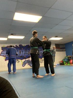 Both adults and youth students learn judo.