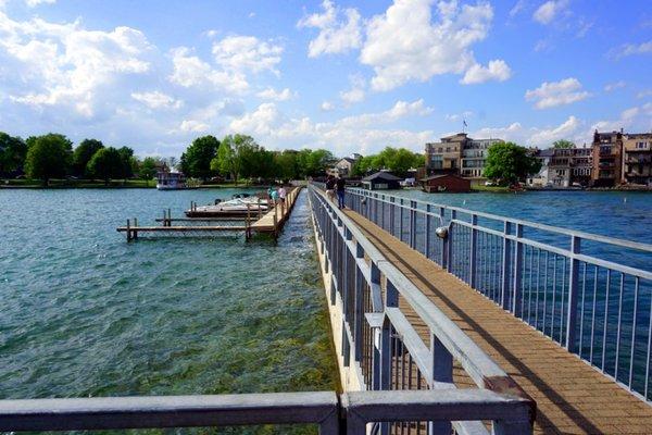 The end of the Pier in Skaneateles looking back. The boat docks offer a great place for boaters to stop so they can shop and dine too!