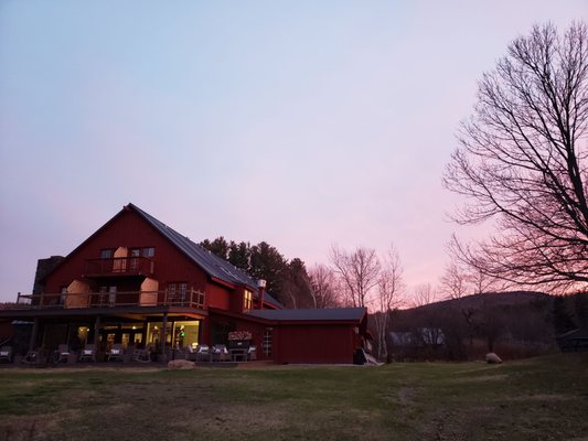 A very spacious outdoor patio with heaters all around