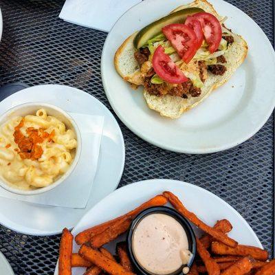 Mac and cheese, chicken po’boy, and sweet potato fries at Bernie’s Southern Bistro