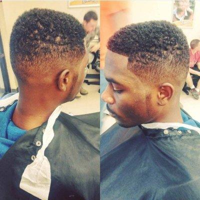 Skin fade with a lineup. Use of electric razor possible, but no straight razors.