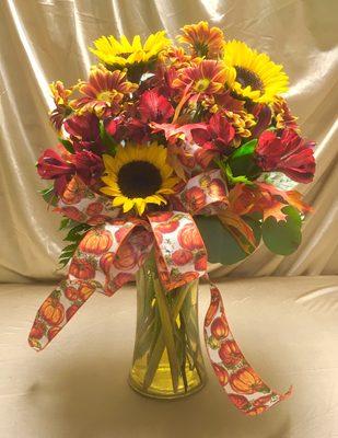 Fall arrangement with sunflowers.