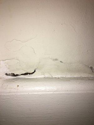 Crappy patch work crack in the wall next to my bedroom closet