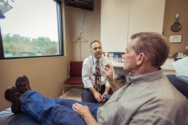 Dr. Ricciardi helping a patient