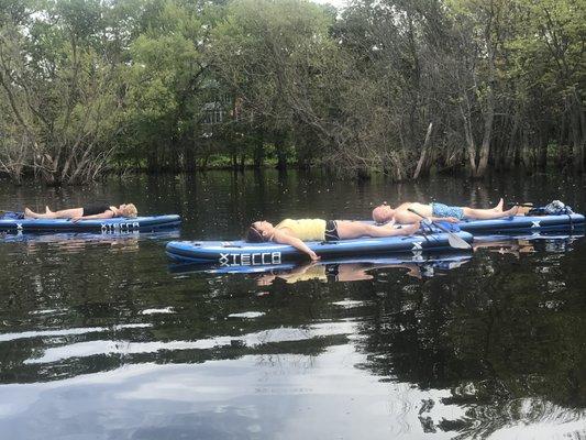 SUP Yoga on the St. Croix! Offered Friday & Saturdays 10-11:30AM during the summer!