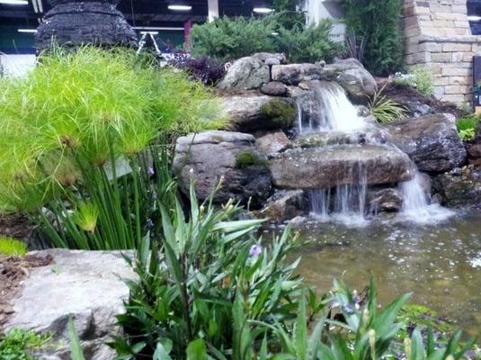 Water Feature custom built along with patios, outdoor kitchens, and more!!