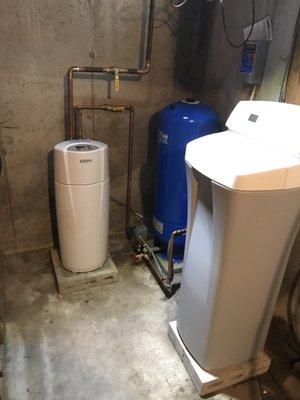 New installation of a pressure tank and controls. A electronic water filter and a water softener.